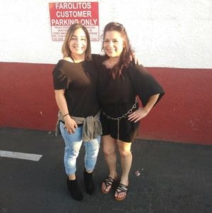 Black jumper with silver belt black saddles